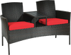 Curved two-seat patio loveseat with red cushions and practical coffee table, crafted from durable rattan for outdoor.