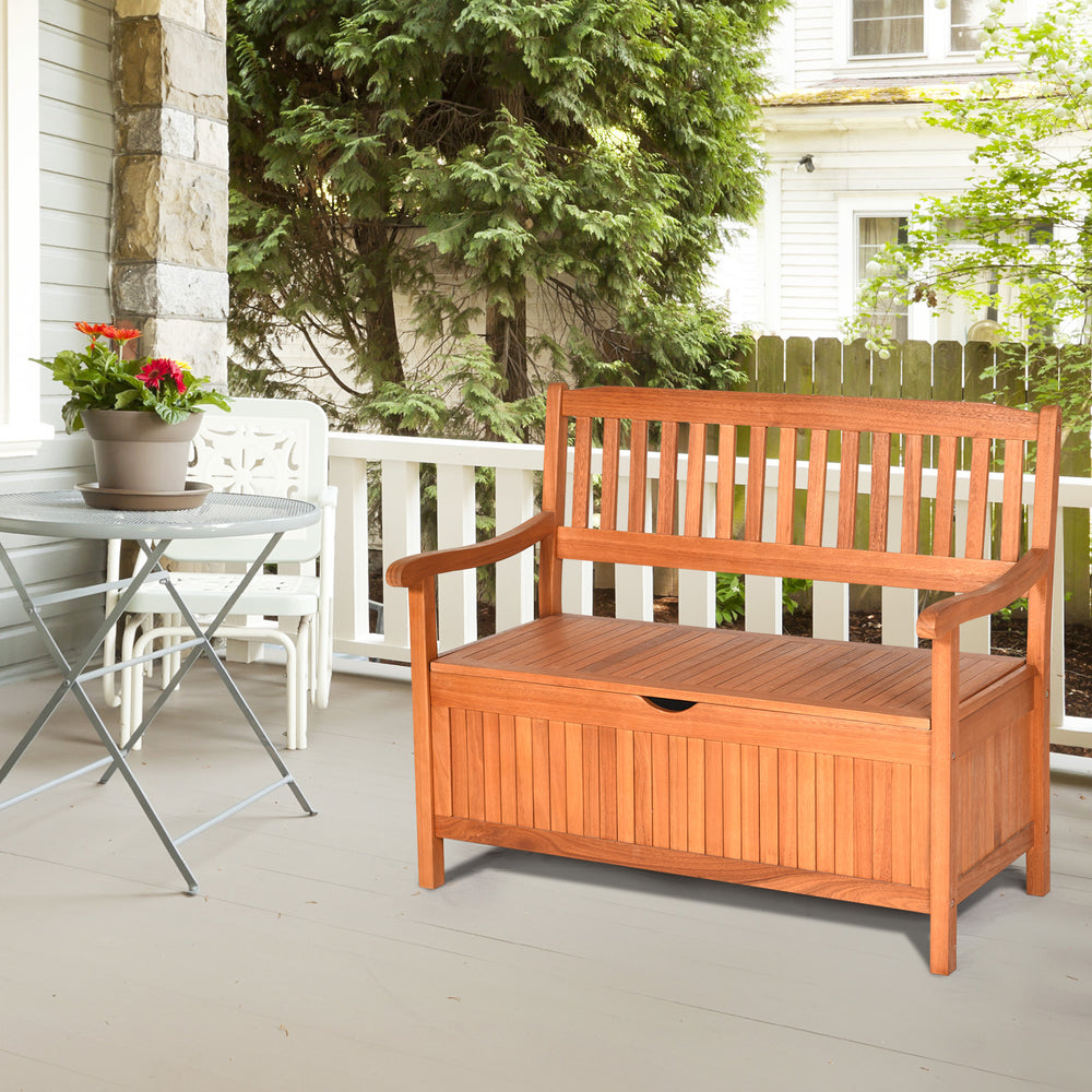 Wooden storage bench in natural teak color with flip-top lid, perfect for patio garden seating and storage.