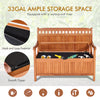 Wooden storage bench with a flip-top lid, featuring a waterproof liner and natural teak color, ideal for patio use.