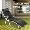 Adjustable black folding chaise lounge chair with removable pillow, sturdy steel frame, perfect for outdoor relaxation.