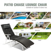 Adjustable black folding chaise lounge chair with removable pillow, perfect for outdoor and indoor relaxation.