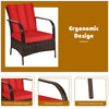 Red cushioned rattan chair with curved armrests, part of a 3 pcs patio furniture set for outdoor relaxation.