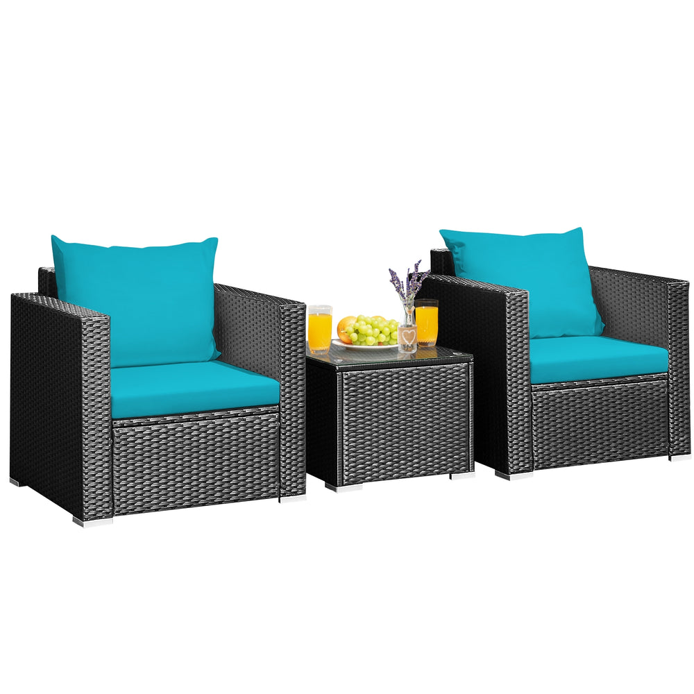 Two turquoise cushioned chairs and a glass-top table in a 3-piece patio wicker conversation set for outdoor relaxation.