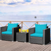 Turquoise cushion patio wicker conversation set with a glass-top table, perfect for outdoor relaxation and gatherings.