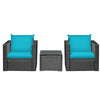 Two turquoise cushioned wicker chairs and a glass-top table in a 3-piece patio set for outdoor relaxation.