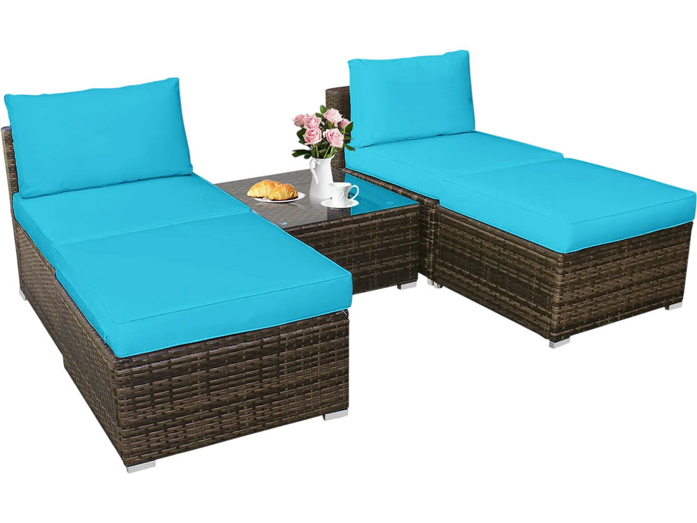 Armless sofa set with turquoise cushions, woven rattan, and a glass-top coffee table, ideal for outdoor relaxation.