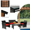 Four-piece patio rattan furniture set with red cushions, featuring a tempered glass coffee table and sturdy steel frame.