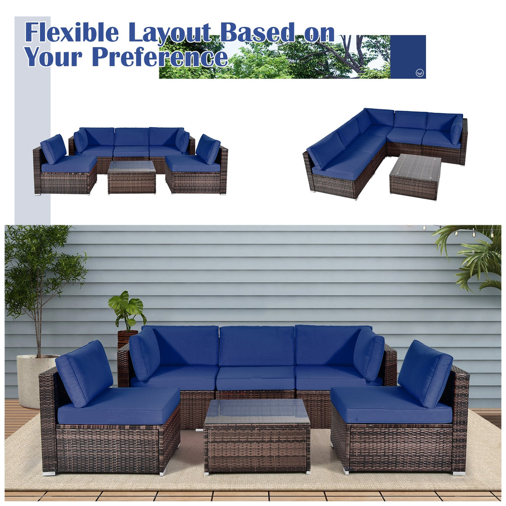 6-piece patio rattan furniture set with navy cushions and glass coffee table, perfect for outdoor relaxation.