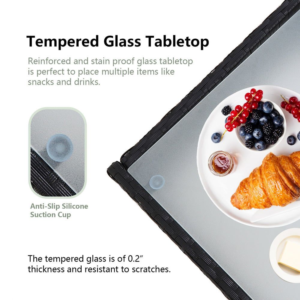 Tempered glass tabletop with anti-slip suction cup, ideal for serving snacks and drinks in a patio rattan furniture set.