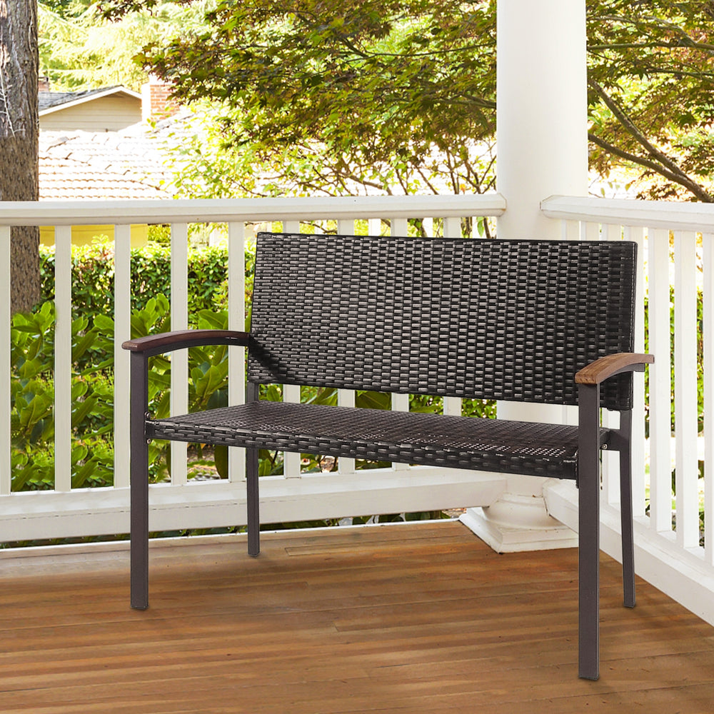 Outdoor patio rattan wicker bench with acacia wood armrests, featuring a durable PE rattan design for garden relaxation.