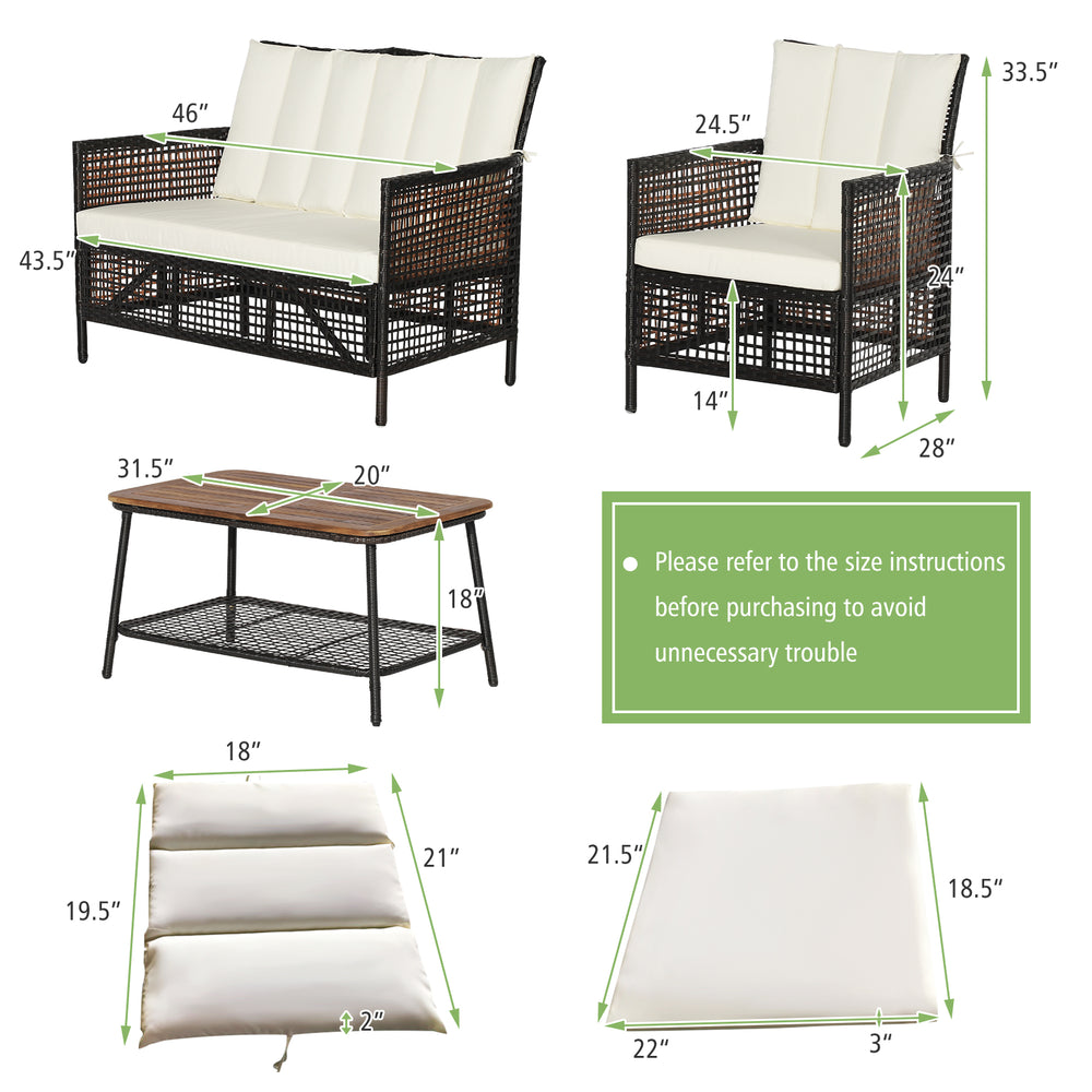 Loveseat and coffee table from the 4-piece patio rattan furniture set with white cushions and acacia wood top.