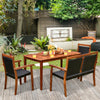 4-piece acacia wood patio dining set with rattan chairs, perfect for outdoor gatherings in gardens or backyards.