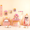 2-in-1 kids princess wooden toy box in pink with safe hinged lid, perfect for storage in a playroom or nursery.