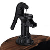 Close-up of the decorative hand pump on the 2-tiers outdoor wooden barrel waterfall fountain for rustic patio decor.