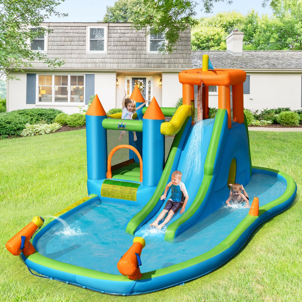 Inflatable water slide bounce house with splash pool, slide, and water cannons for outdoor fun in the yard.