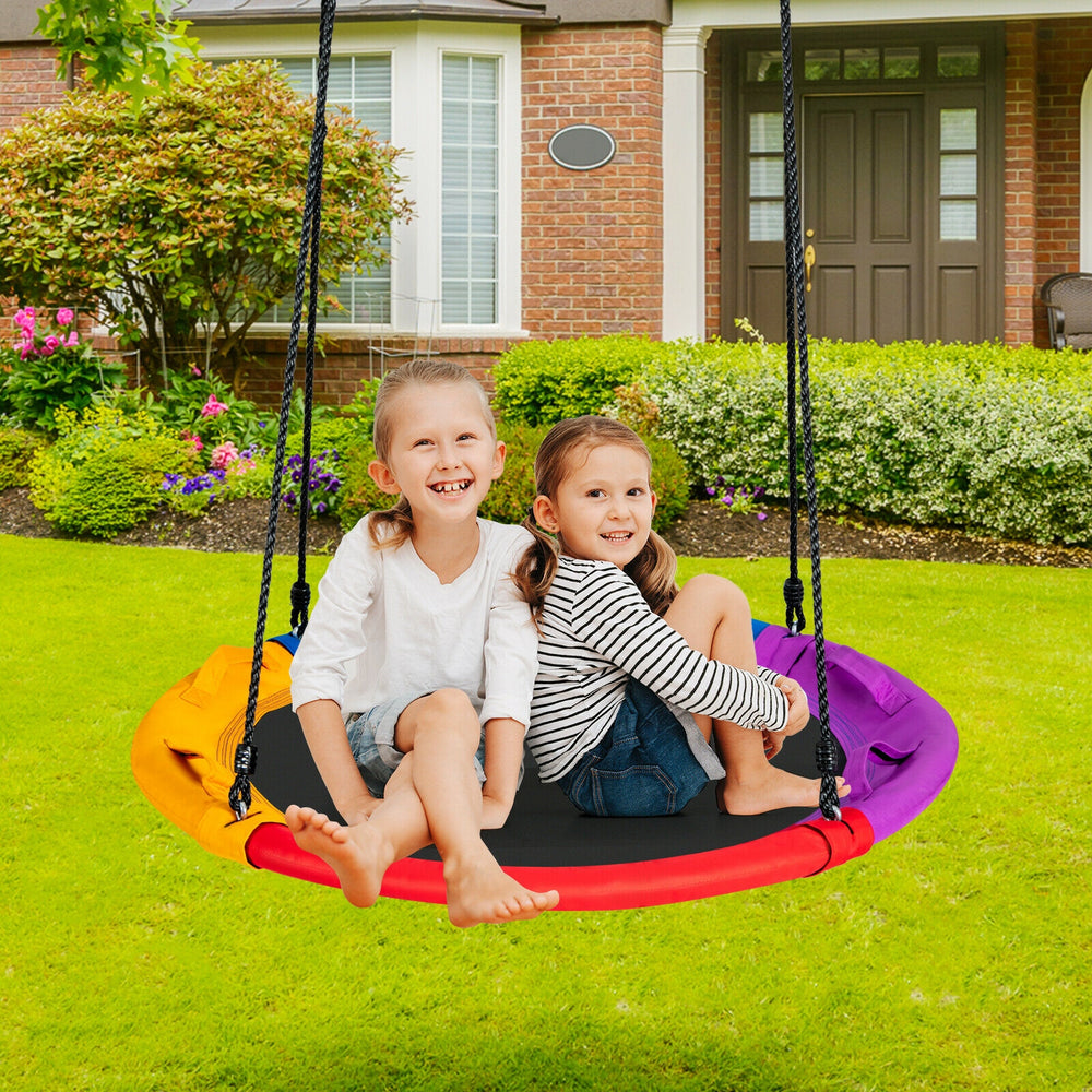 Round 40-inch multicolor saucer swing with pillow and handles, perfect for 2-3 kids in the backyard.