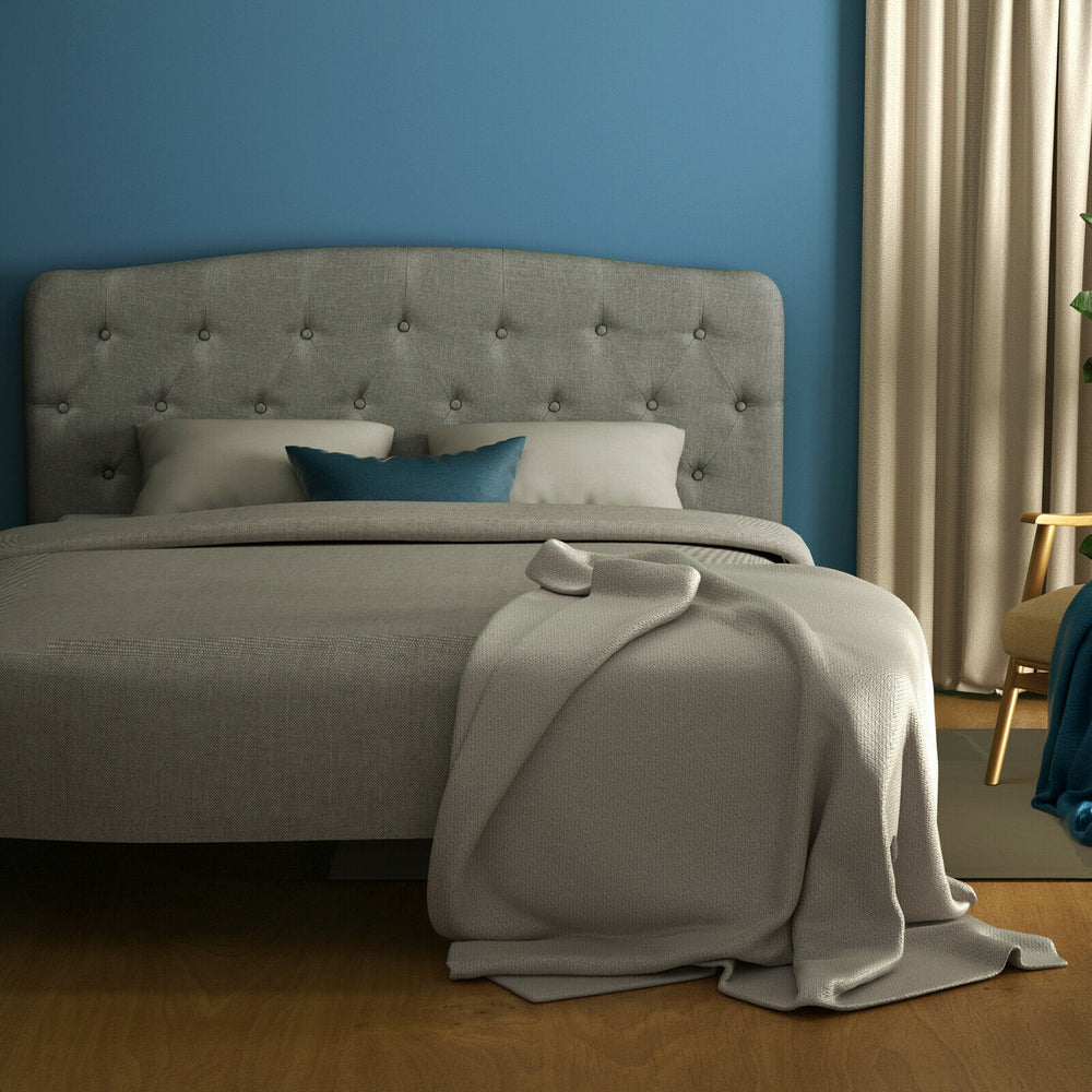 Light gray faux linen headboard with button detailing, adjustable heights for full size bed, adds elegance to any room.