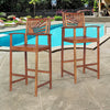 Two outdoor acacia wood bar chairs with sunflower backrest and armrests, perfect for patio relaxation by the pool.
