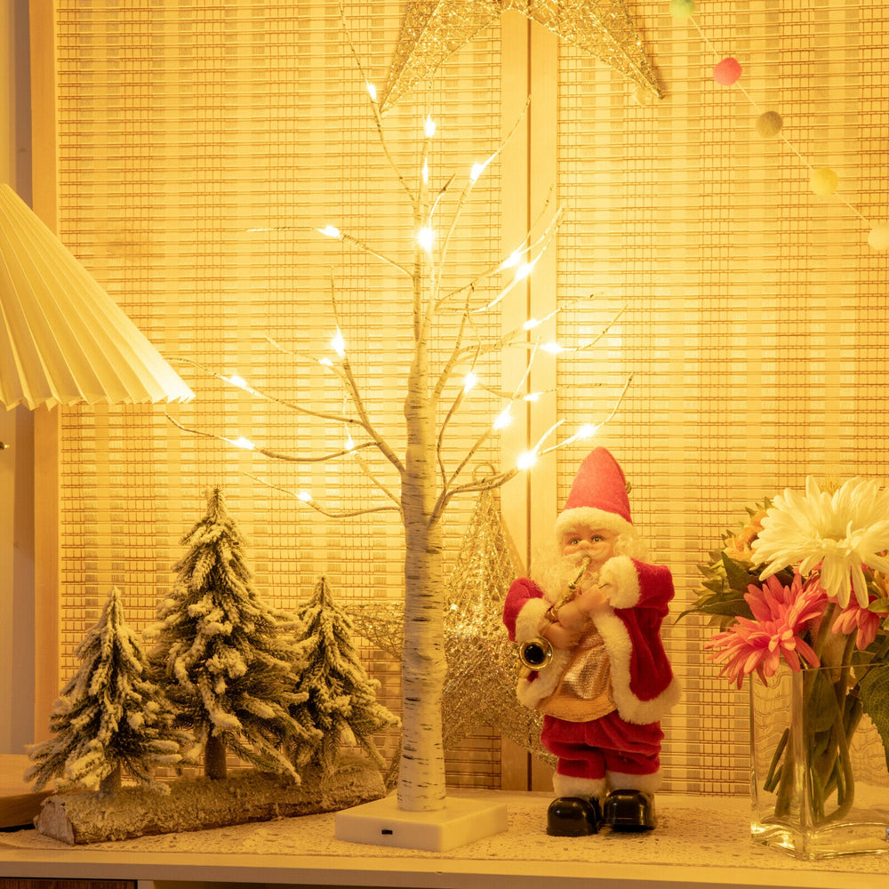 Pre-lit 2 feet white twig birch tree with 24 LED lights, perfect for festive indoor holiday decoration.