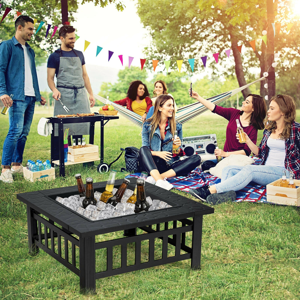 32-inch 3-in-1 outdoor fire pit table with BBQ grill, featuring a heat-resistant black coating for backyard gatherings.