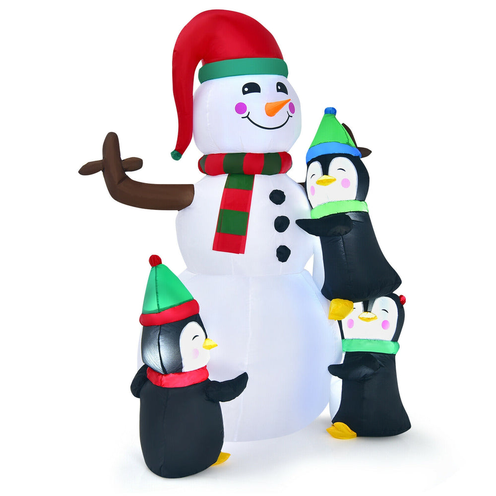 6ft inflatable snowman with three penguins, featuring bright lights, perfect for festive outdoor Christmas decoration.