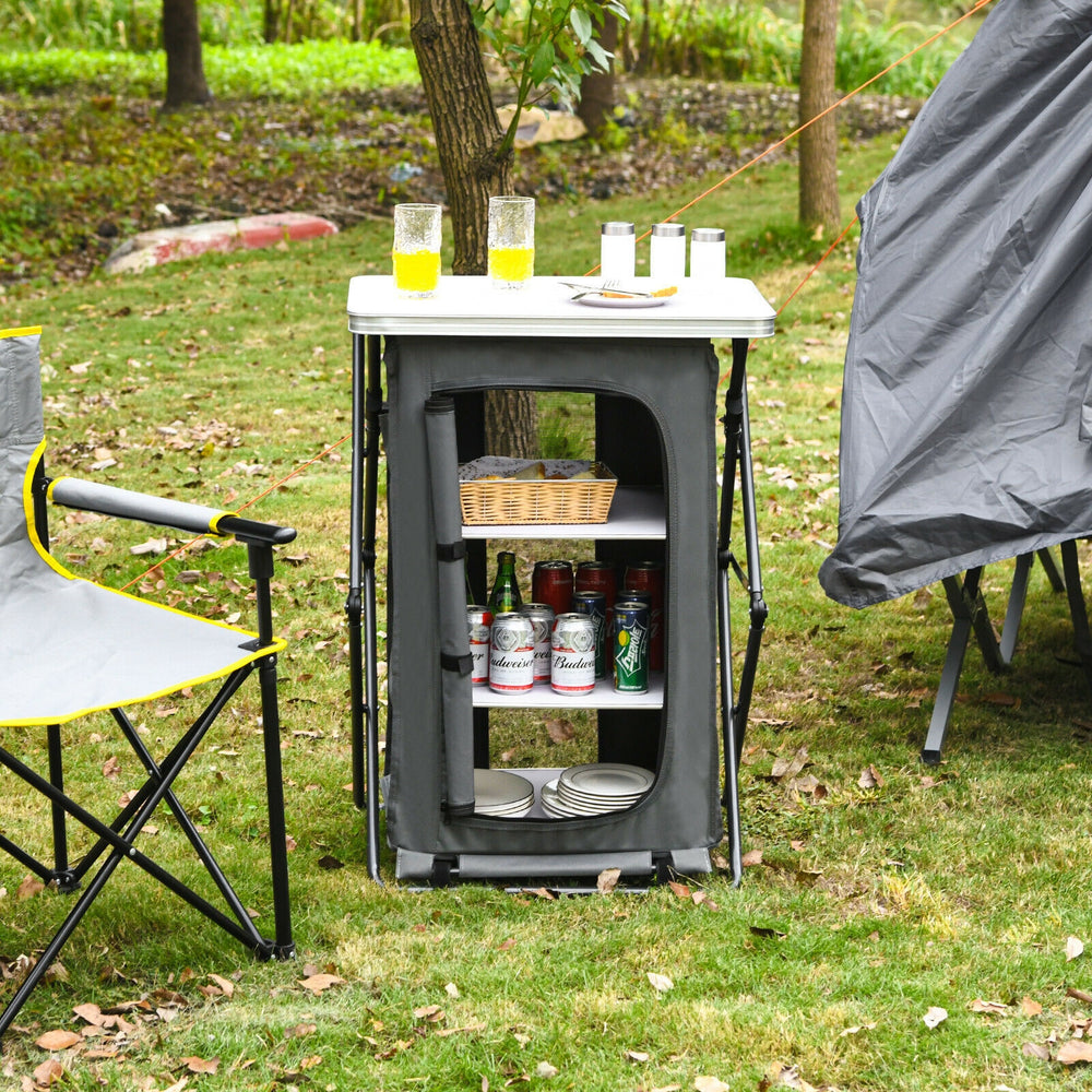 Folding camping storage cabinet with 3 shelves, waterproof oxford cloth, ideal for outdoor activities and easy.