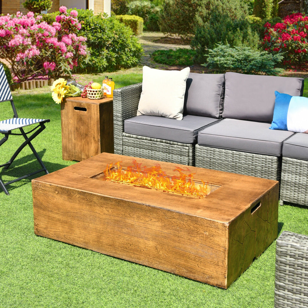 Outdoor propane fire pit table with classic wood finish, 50,000 BTU, perfect for backyard gatherings and relaxation.