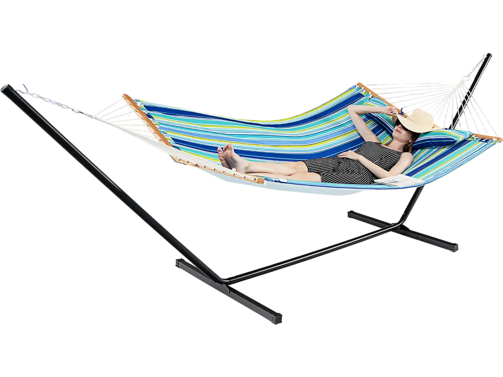 Colorful patio hammock with detachable pillow, made of durable polyester, perfect for outdoor relaxation on the beach.