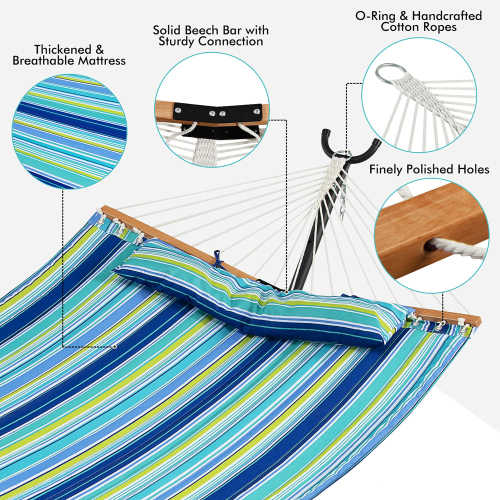 Patio hammock with blue striped fabric, curved beech wood spreader, and detachable pillow for comfortable outdoor.