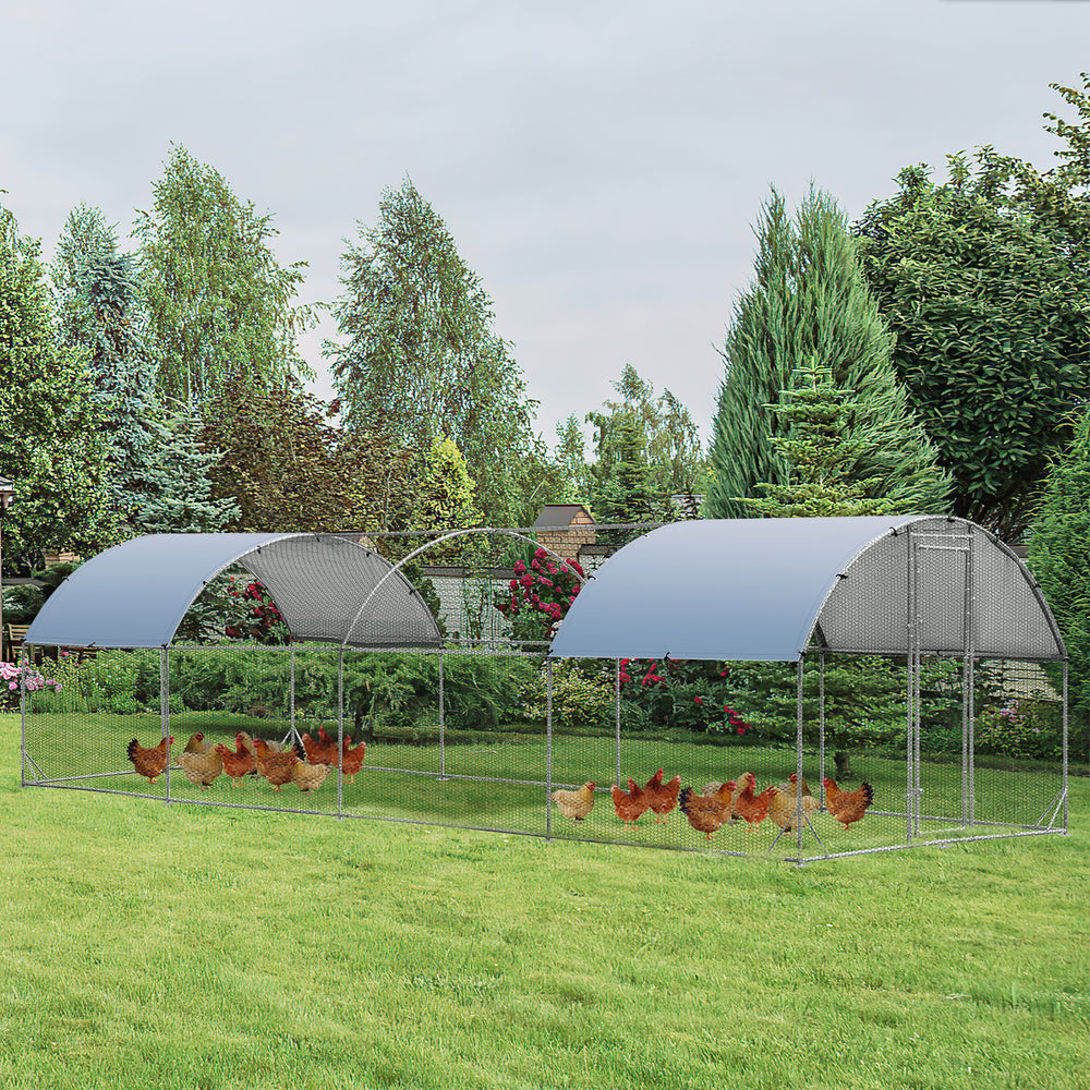 Large metal chicken coop with cover, featuring a sturdy galvanized steel frame and waterproof design for backyard use.