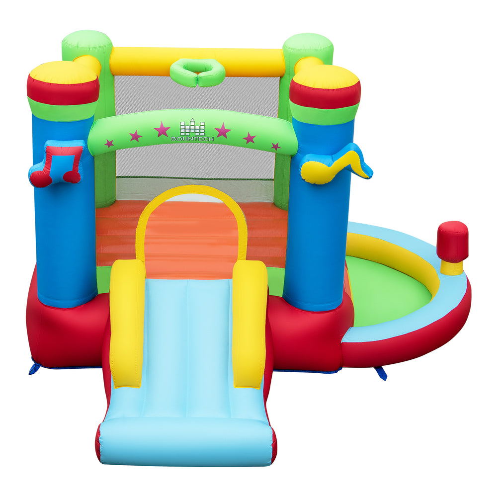 Music-themed inflatable bounce house with slide, ball pit, and basketball hoop for outdoor fun and active play.