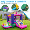 Inflatable bounce house with slide, splash pool, and ring toss games in vibrant unicorn theme for outdoor fun.