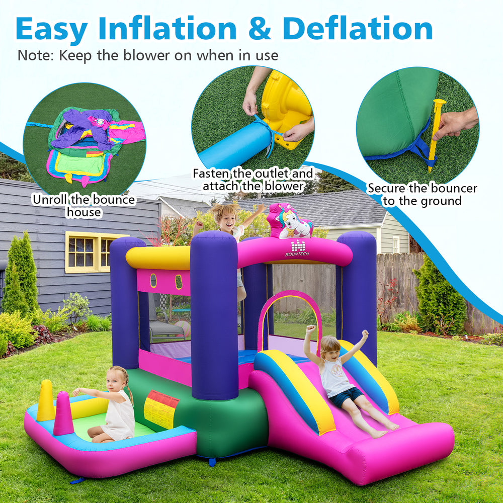 Inflatable bounce house with slide, splash pool, and ring toss games in vibrant unicorn theme for outdoor fun.