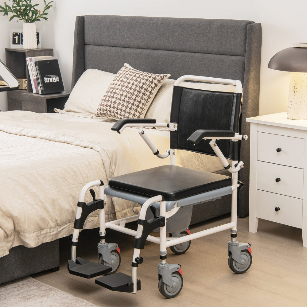 4-in-1 bedside commode wheelchair with detachable bucket, adjustable height, and waterproof PVC surface for comfort.