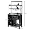 Freestanding black kitchen baker's rack with 3-tier shelves, wine glass holder, drawer, and wine bottle storage.