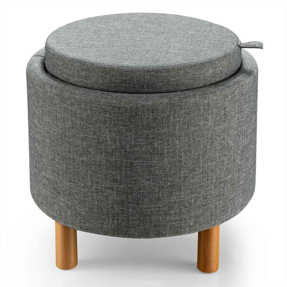Round gray fabric storage ottoman with removable lid and wooden tray, featuring solid wood legs and non-slip pads.
