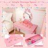 Kids vanity set in pink featuring a lighted mirror, spacious tabletop, and large pull-out drawer for storage.