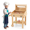 Kids wooden barbecue grill playset with food accessories, wheels, and storage rack for realistic pretend cooking fun.