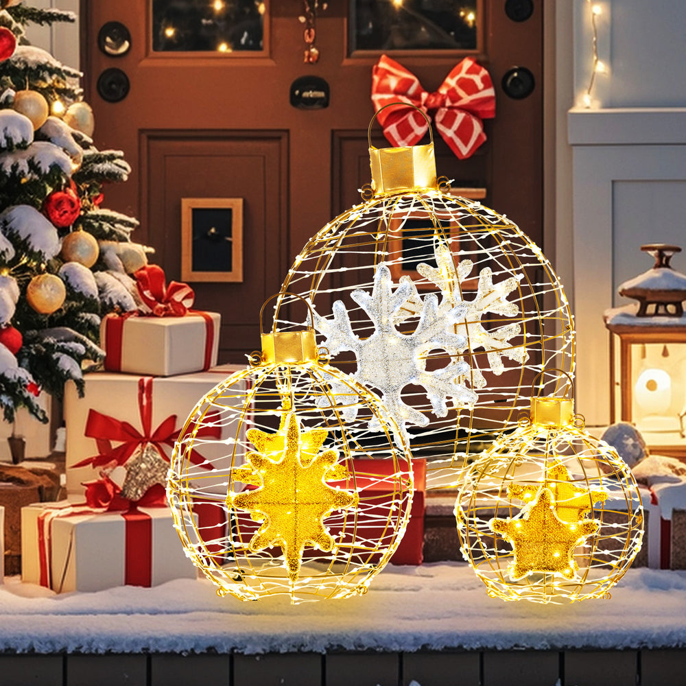 Three pre-lit lantern balls with 732 LED lights, showcasing festive designs, perfect for outdoor holiday decoration.