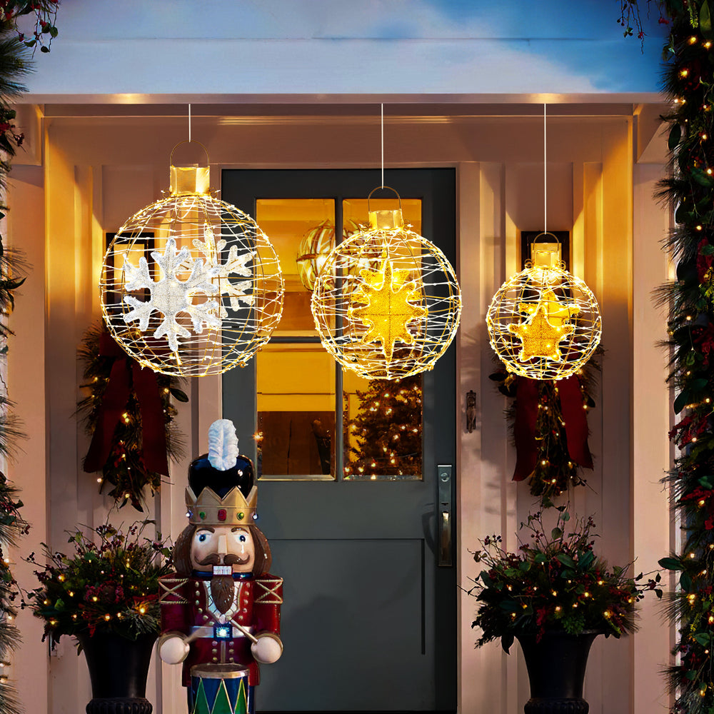 Three pre-lit lantern balls with 732 LED lights, showcasing unique patterns, perfect for outdoor holiday decor.