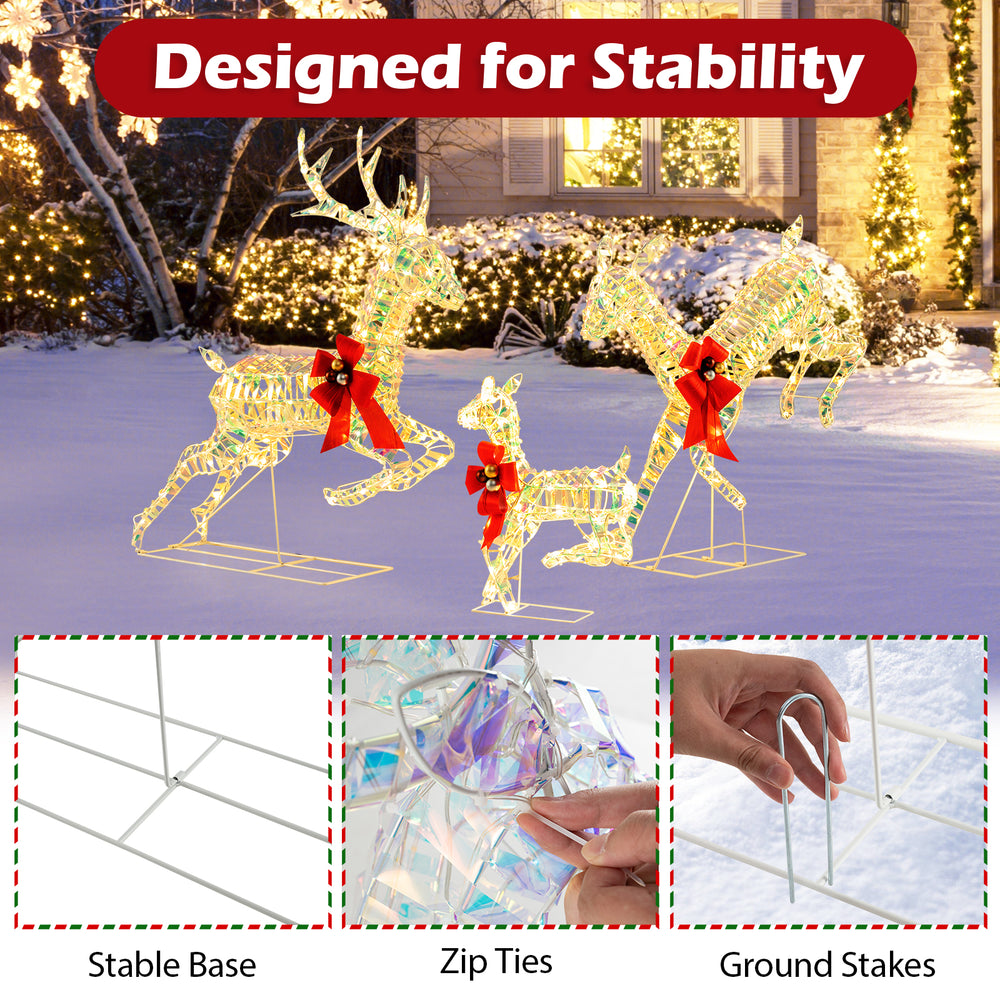 Lighted Christmas reindeer family with bows, featuring a stable base, zip ties, and ground stakes for outdoor stability.