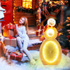 Lighted snowman with 105 LED lights, dressed in a cap and scarf, perfect for festive outdoor decoration.