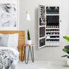 Lockable wall-mounted jewelry cabinet in white with LED lights, featuring a full-length mirror and ample storage for.
