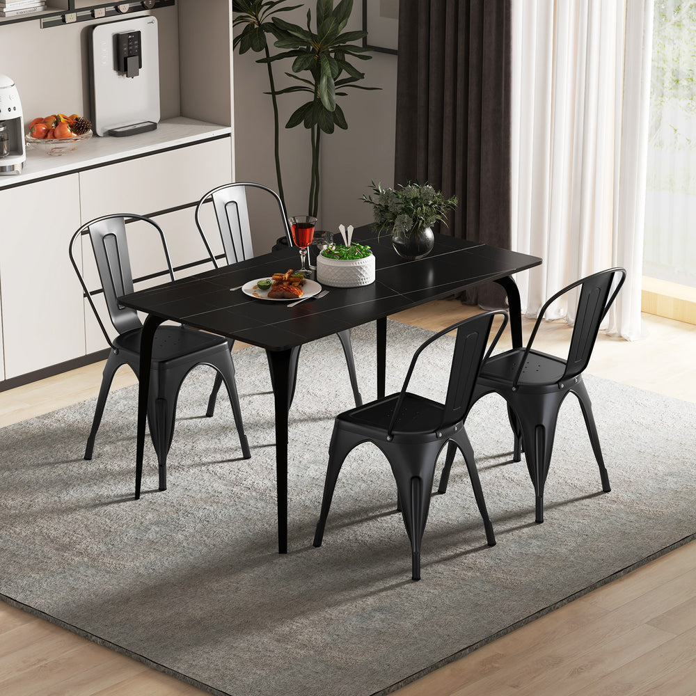 Black metal dining table set with four stackable chairs, featuring removable backrests for versatile dining spaces.