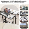 Mobile stand-up computer desk with adjustable tilting desktops in black, ideal for office, bedroom, or small spaces.