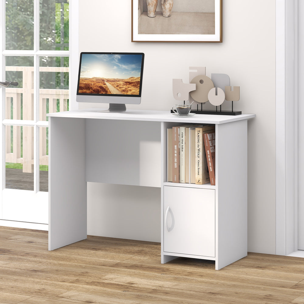 Modern white computer desk featuring a spacious top, open shelf, and cabinet for versatile storage in any workspace.