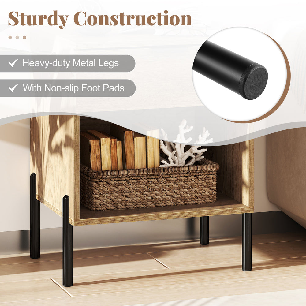Close-up of the modern nightstand's sturdy metal legs with non-slip foot pads, featuring a natural wood grain surface.