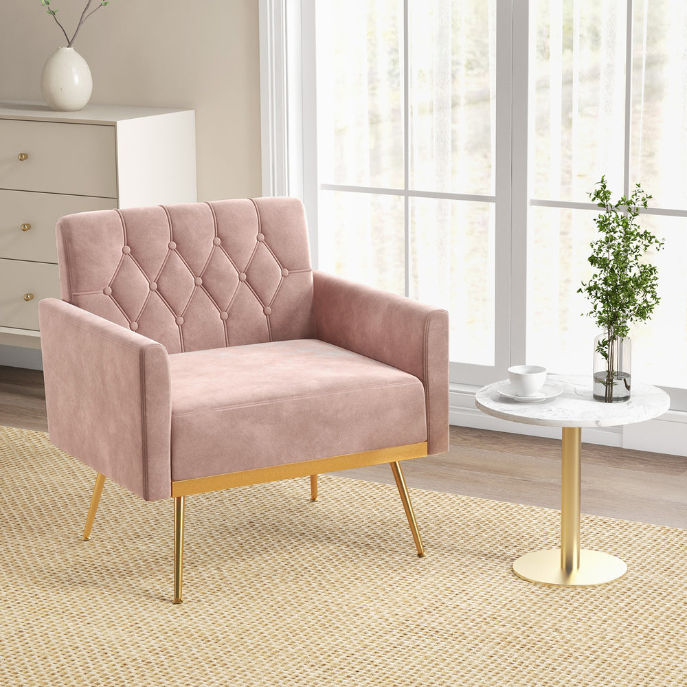 Modern pink velvet accent chair with button tufted back and golden metal legs, ideal for stylish living room seating.