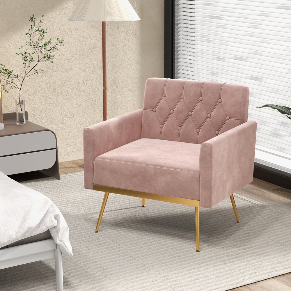Modern pink velvet accent chair with button tufted back and golden metal legs, ideal for reading or relaxing.
