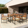 7-piece patio dining set featuring acacia wood table and soft cushioned chairs, perfect for outdoor dining and.
